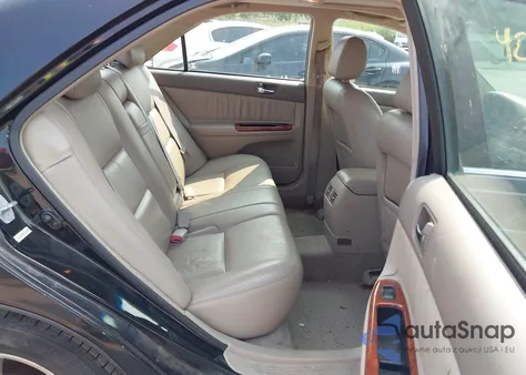 2003 Toyota Camry Xle z USA, uszkodzony, nr VIN 4T1BE30KX3U197331